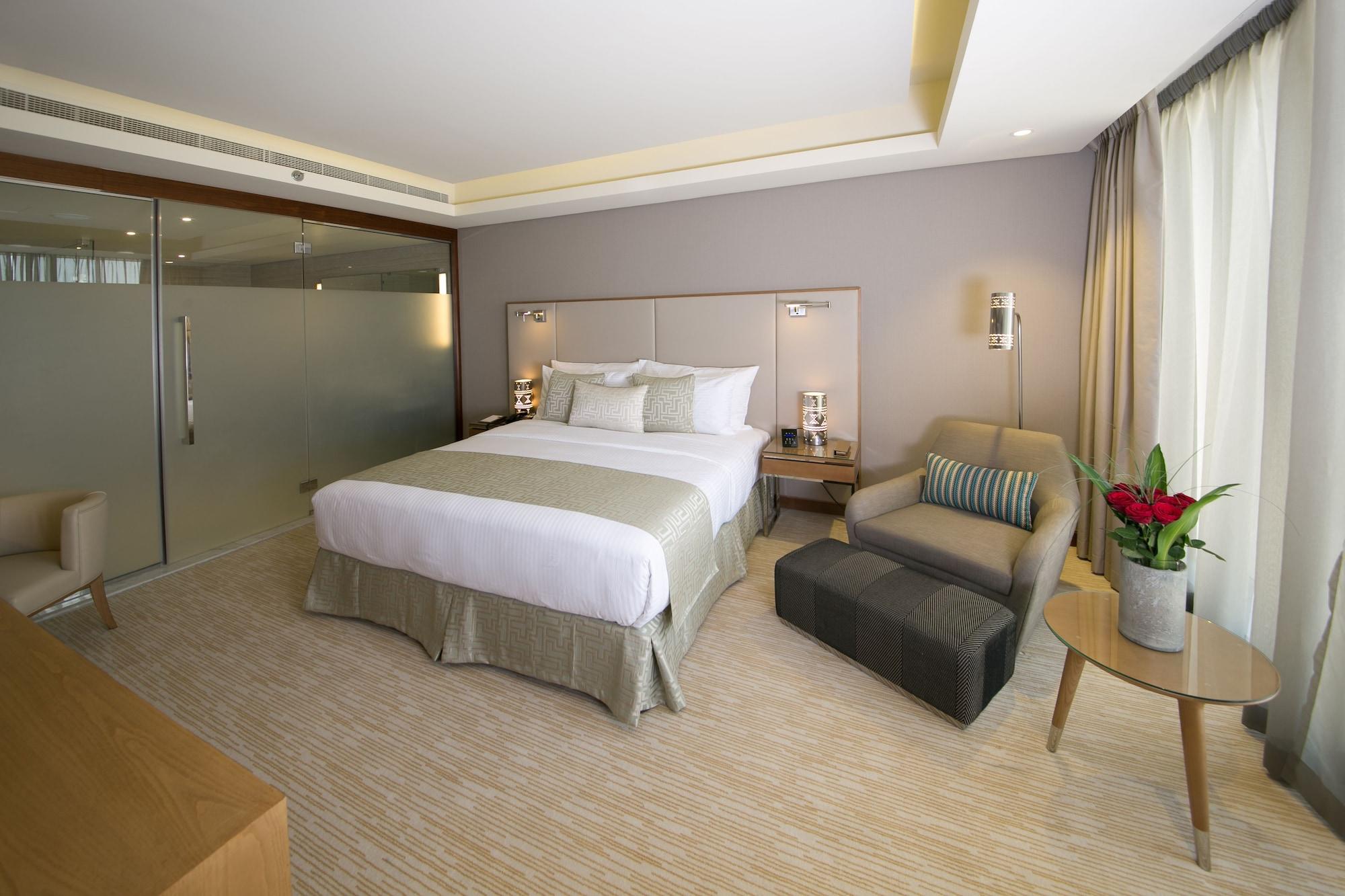 Grand Millennium Muscat Hotel Exterior foto Deluxe Room