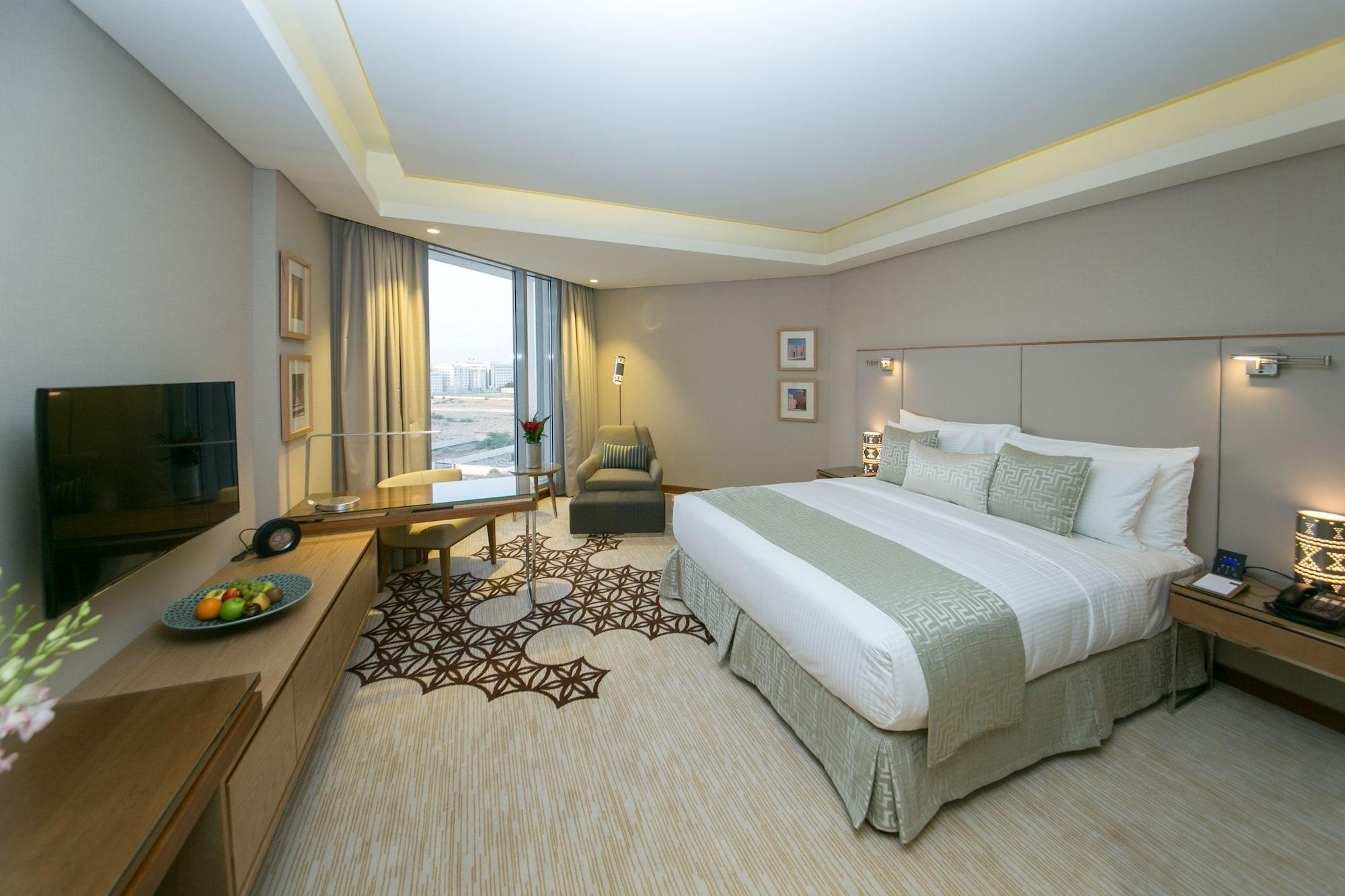 Grand Millennium Muscat Hotel Exterior foto Deluxe Room