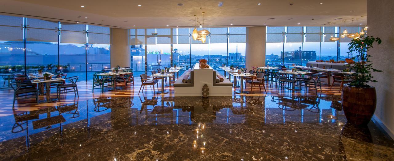 Grand Millennium Muscat Hotel Exterior foto The restaurant